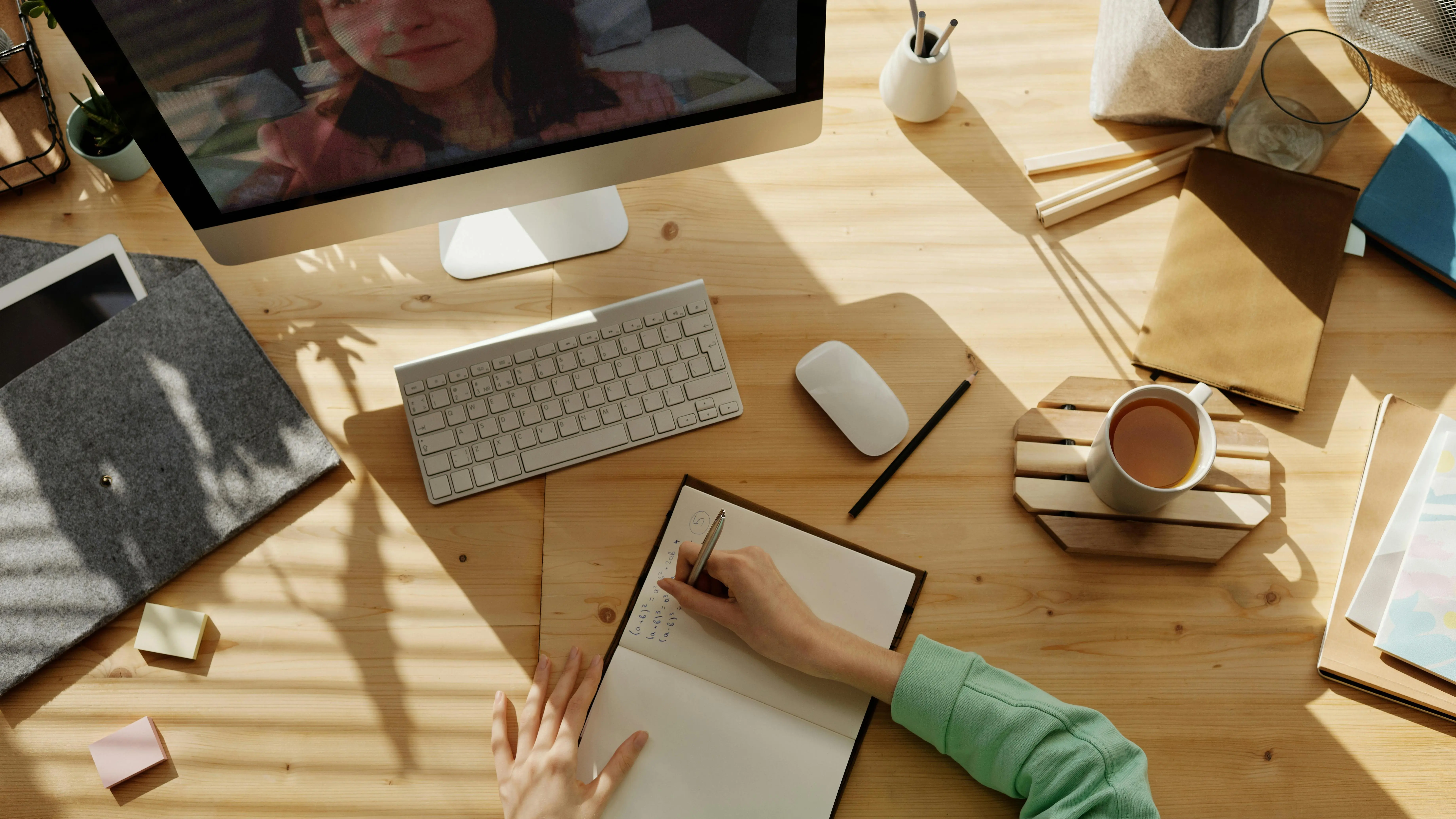 Writer crafting notes on developing a strong protagonist