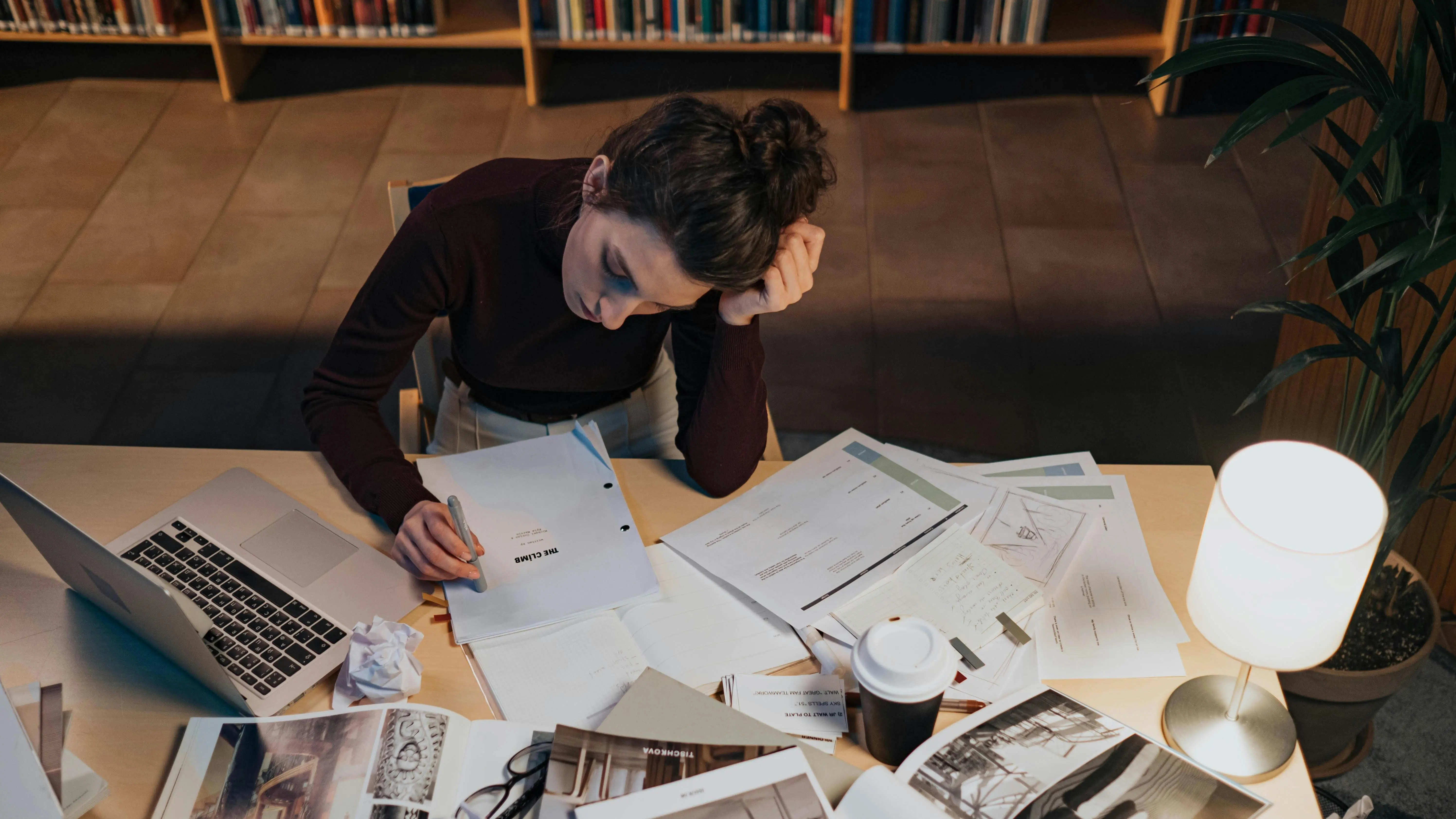 Woman Reviewing Screenplay Coverage Notes