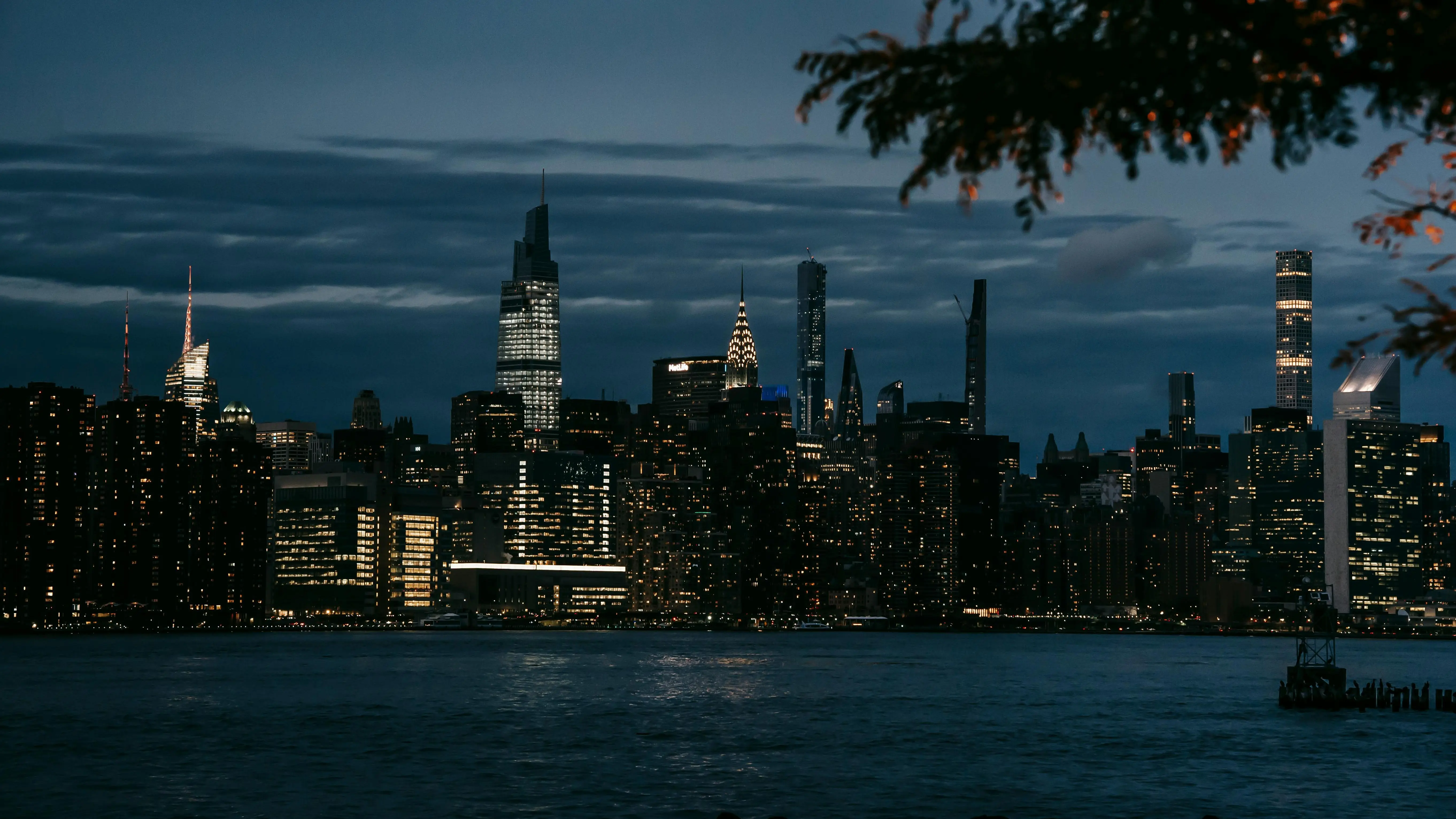 New York City skyline at night, representing AI movies themes