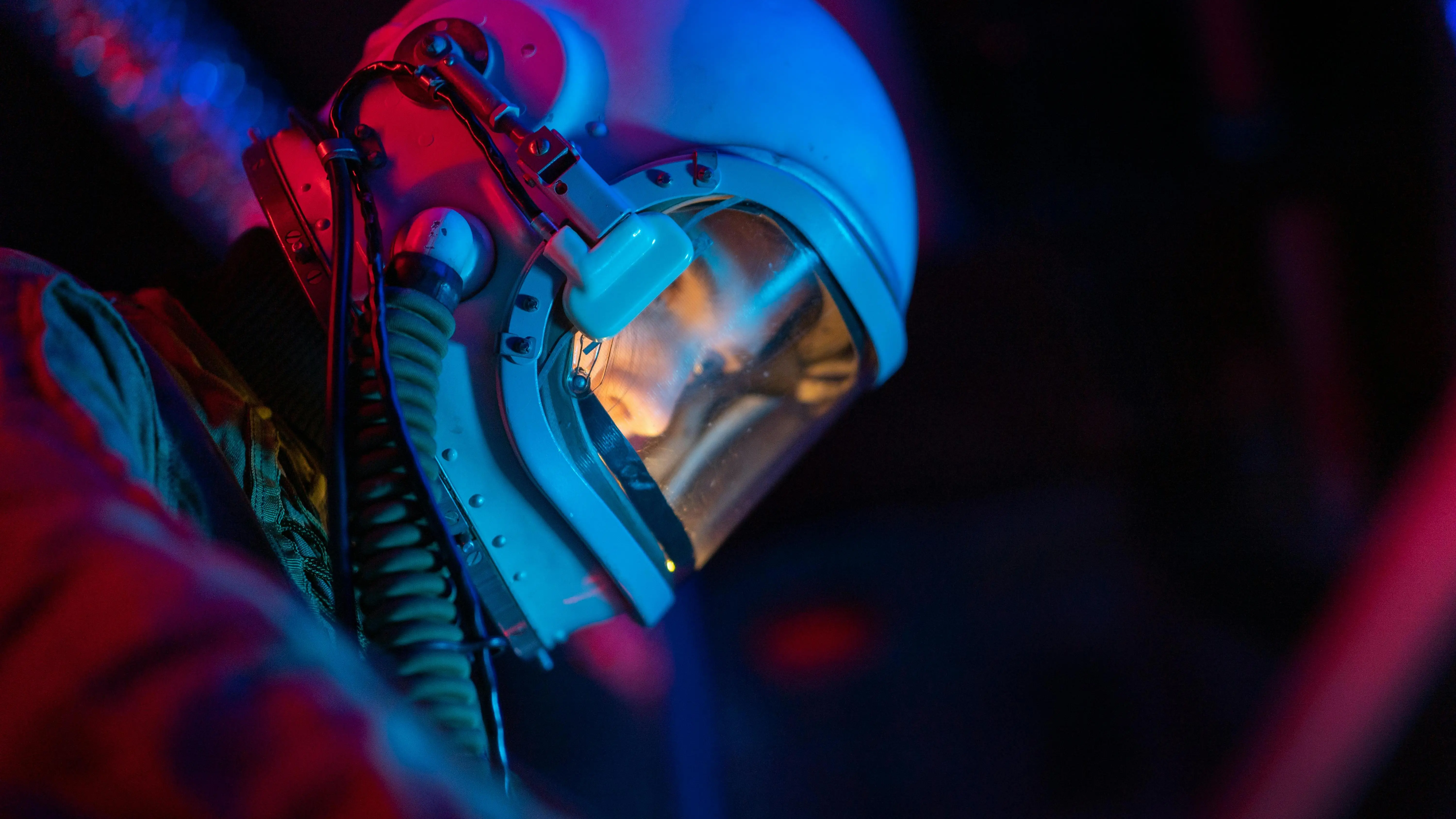 Astronaut woman in blue helmet in a science fiction movie