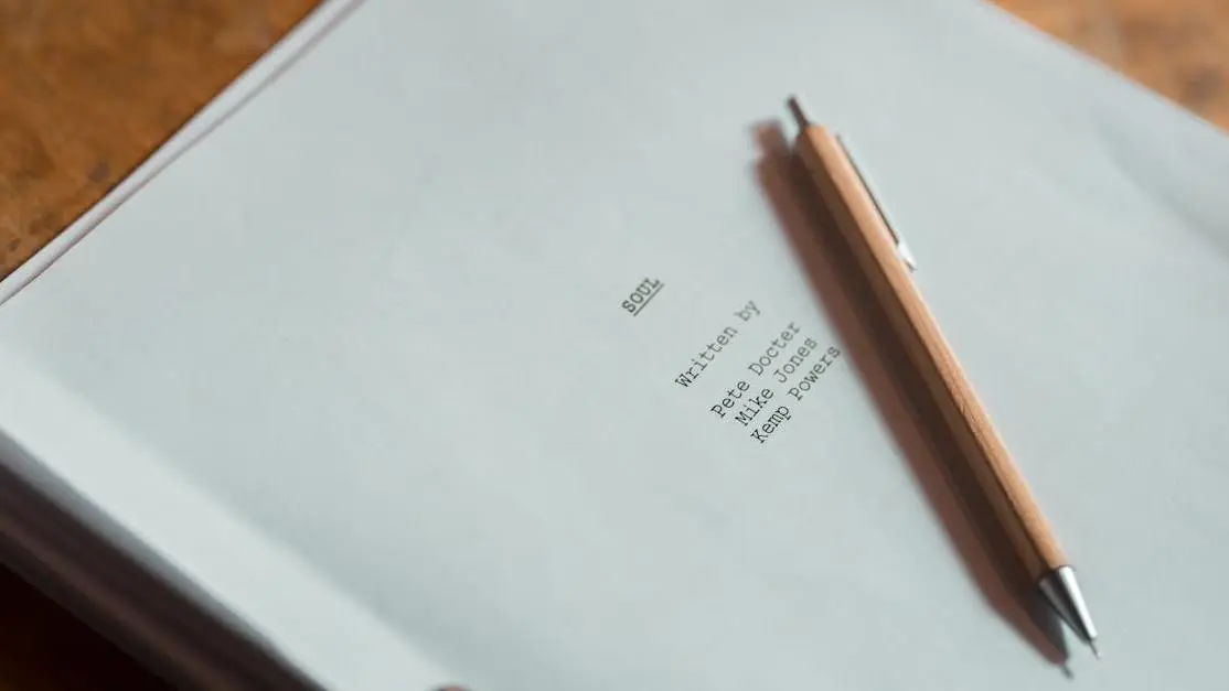 Pen resting on a document explaining script closure