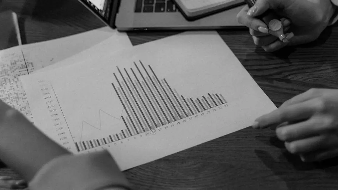 Person reviewing notes for formatting and writing studio script coverage