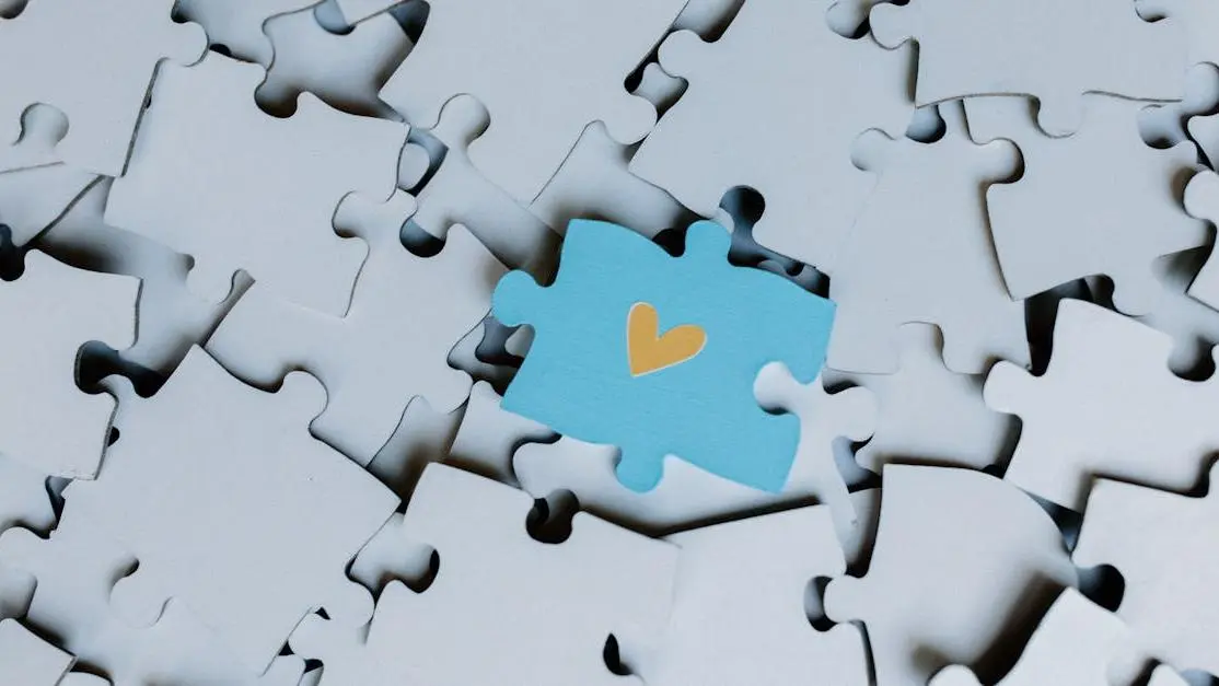 Unique blue puzzle piece with heart symbol, illustrating the concept of developing your TV show bible.